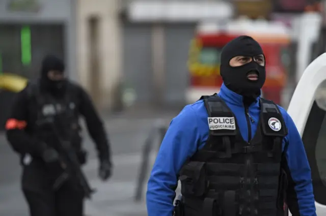 Policeman in balaclava