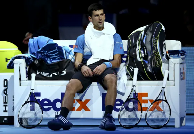 Novak Djokovic looks on inbetween games