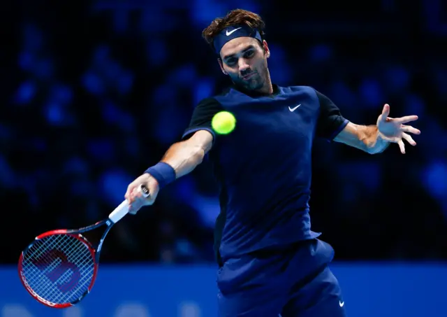 Roger Federer of Switzerland plays a forehand