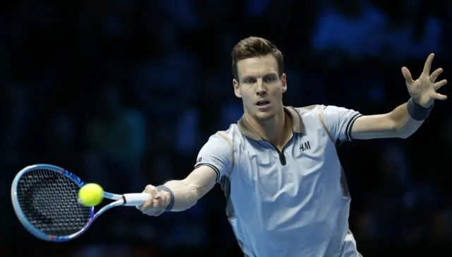 Tomas Berdych hits a return