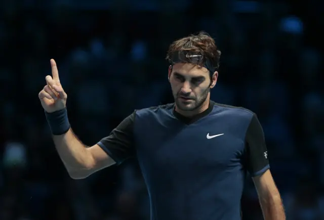 Roger Federer celebrates winning a point