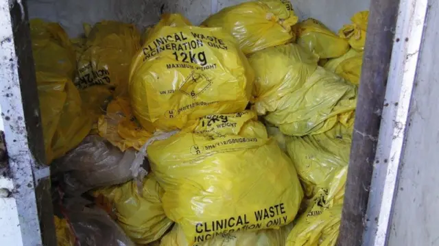 Remains in yellow bags