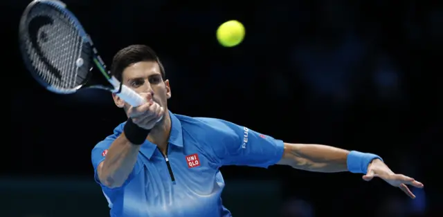 Novak Djokovic hits a return