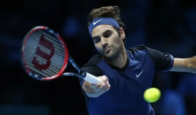 Roger Federer plays a forehand shot