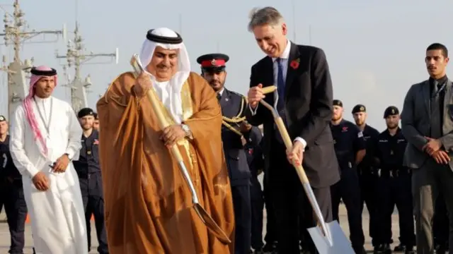 Philip Hammond and Bahraini Foreign Minister Sheikh Khalid bin Ahmed Al Khalifa lay the first cornerstone of the new base