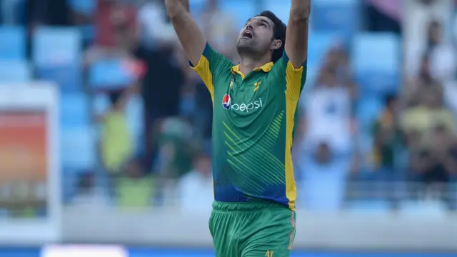 Mohammad Irfan of Pakistan celebrates