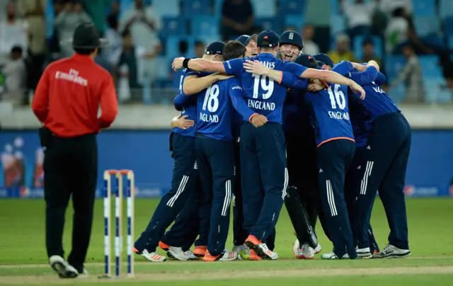 England celebrate taking the final wicket