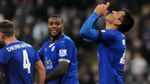 Leonardo Ulloa celebrates