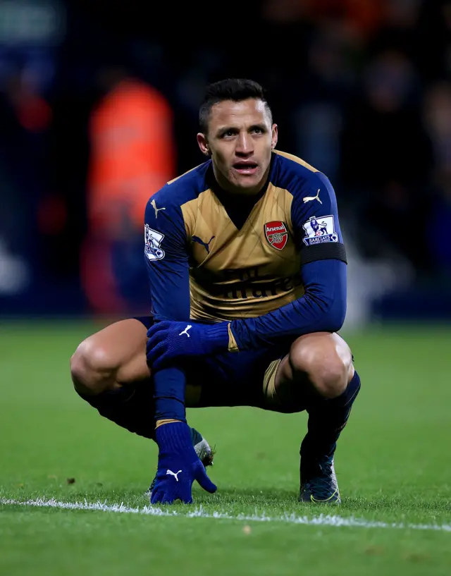 Alexis Sanchez of Arsenal looks dejected