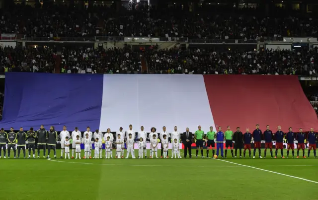 Players from Real Madrid and Barcelona pay their respects to victims of the Paris attacks