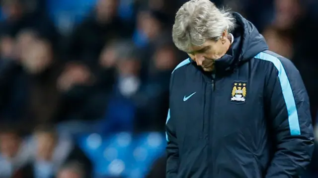 Manuel Pellegrini looks down on the touchline