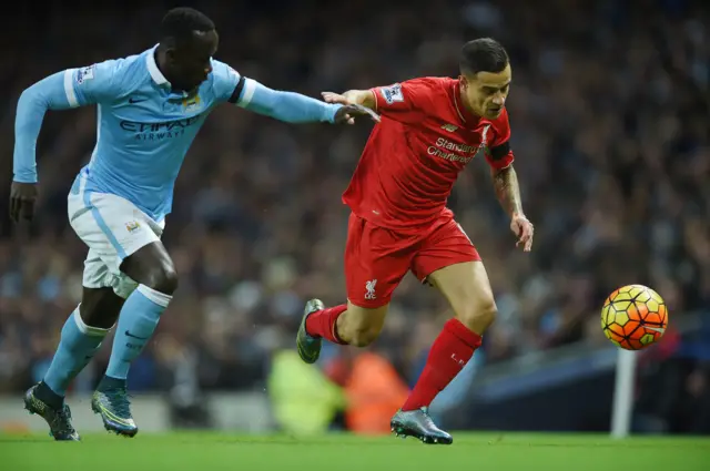 Philippe Coutinho races ahead of Yaya Toure