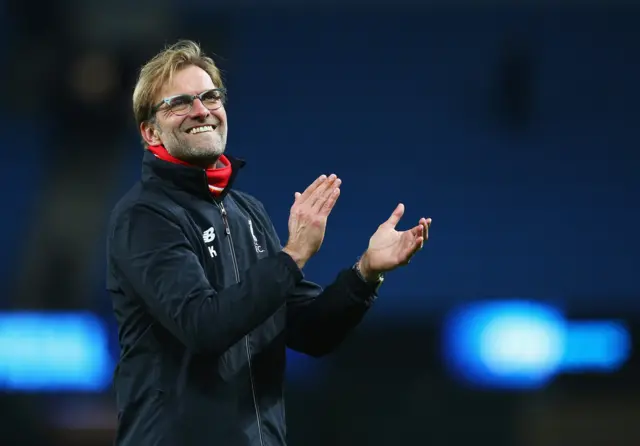 Jurgen Klopp applauds the Liverpool fans