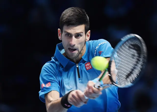 Novak Djokovic hits a backhand