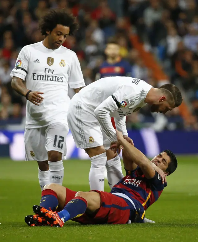 Sergio Ramos clashes with Luis Suarez