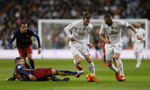 Gerard Pique tackles Karim Benzema