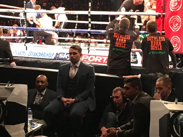 Amir Khan watches the Martin Murray fight on TV