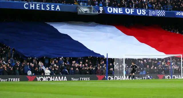 A French flag on display at Stamford Bridge