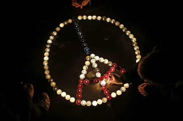 Candles lit at the Place de la Republique