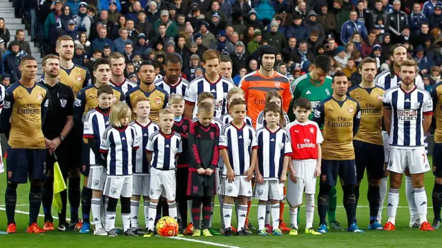 Arsenal and WBA players before kick-off