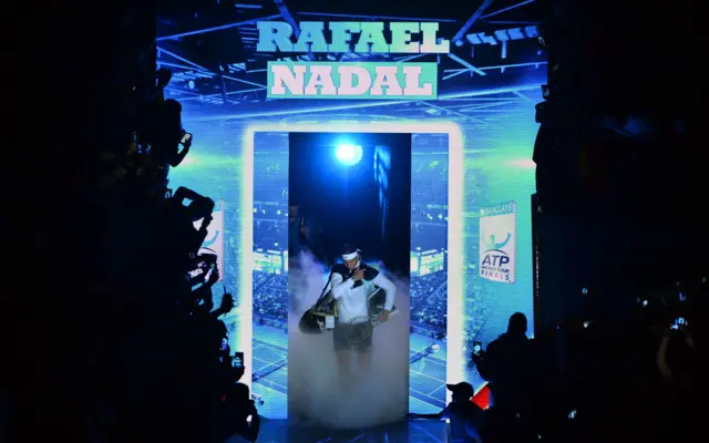 Rafael Nadal enters the court