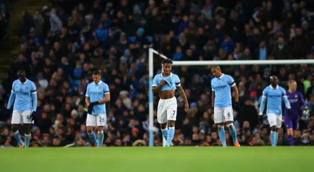 City players look dejected after conceding a third goal