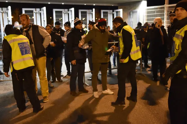 Juventus fans are checked by security