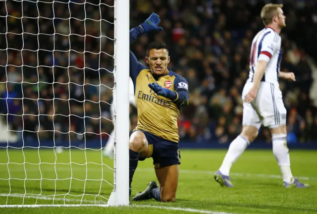 Alexis Sanchez reacts to missing a chance