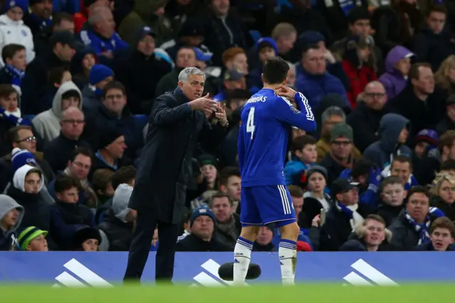 Jose Mourinho chats to Cesc Fabregas