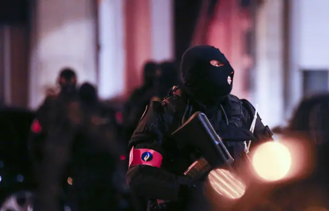 Belgian security forces during a police operation in Molenbeek