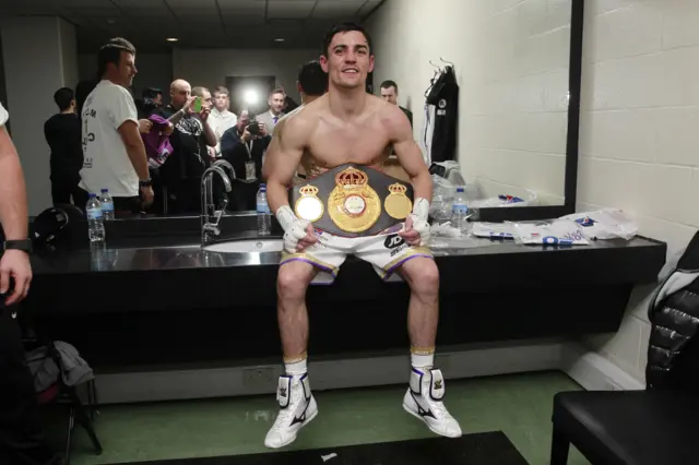 Anthony Crolla with his title belt in his dressing room