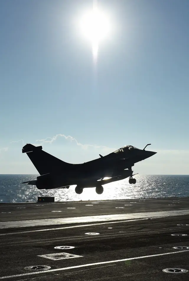 A French Rafale jet fighter is catapulted off the Charles de Gaulle aircraft carrier, 22 November