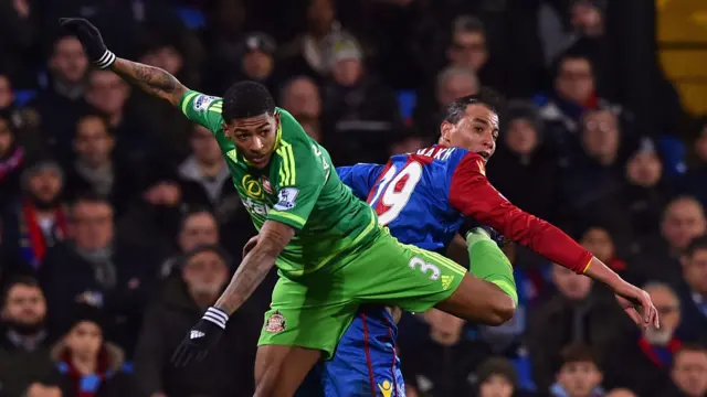 Crystal Palace striker Chamakh goes up for header