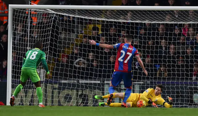 Wayne Hennessey dives low to save