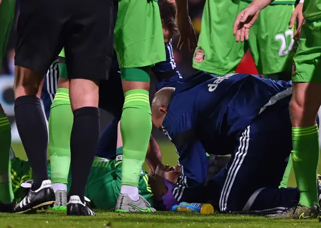 John O'Shea goes down with an injury