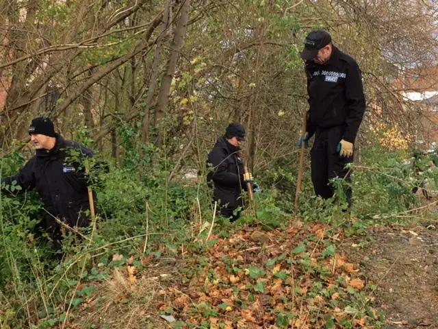 Three officers searching at Porter Brook