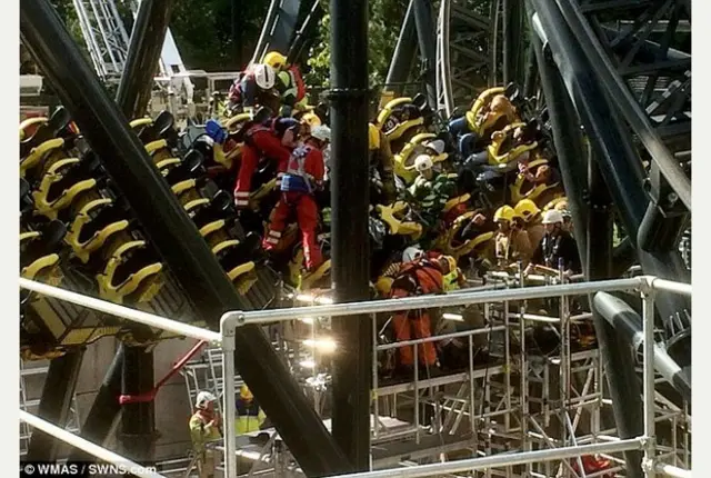 Firefighters performing a rescue after The Smiler ride crash at Alton Towers in June