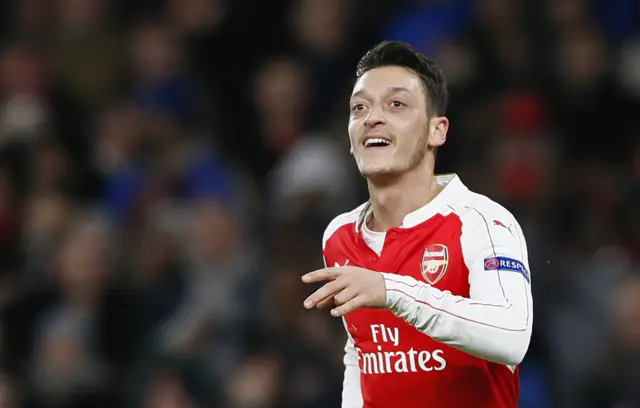 Mesut Ozil celebrates