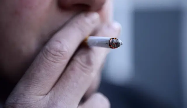 Close-up of a man smoking