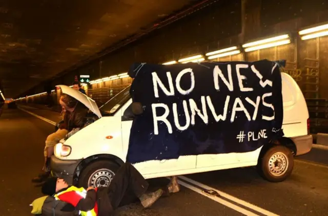 Protesters at Heathrow Airport block the roads