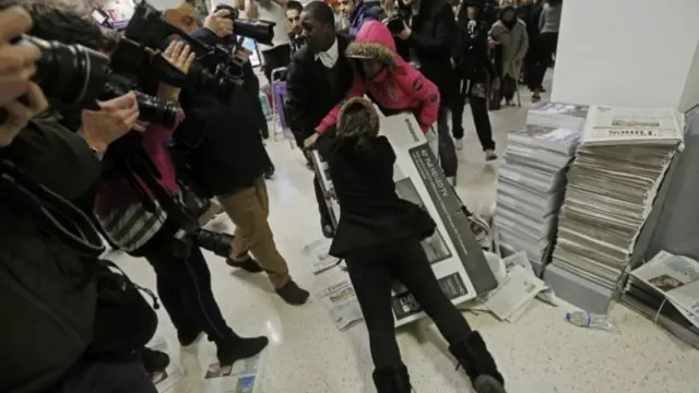 Black Friday shoppers wrestle over a TV