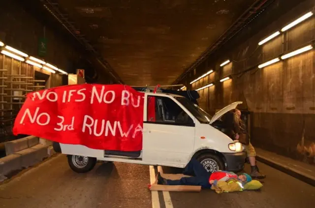 Plane Stupid handout photo of their protest in the inbound tunnel to Heathrow Airport in a demonstration against airport expansion.