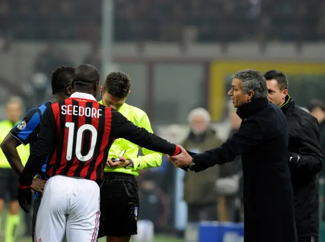 Clarence Seedorf and Jose Mourinho