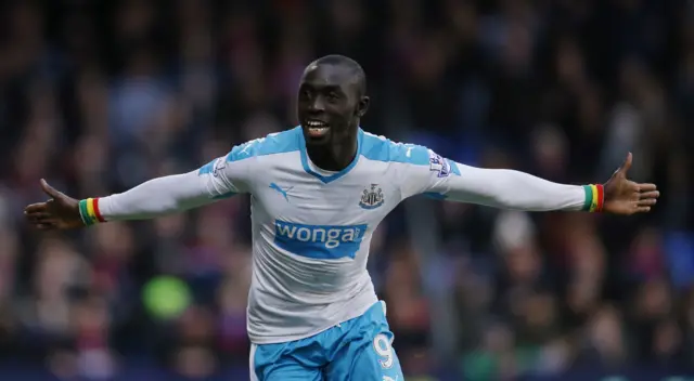 Papiss Cisse celebrates after scoring the first goal for Newcastle