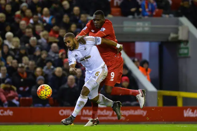 Ashley Williams (left) and Liverpool's Christian Benteke