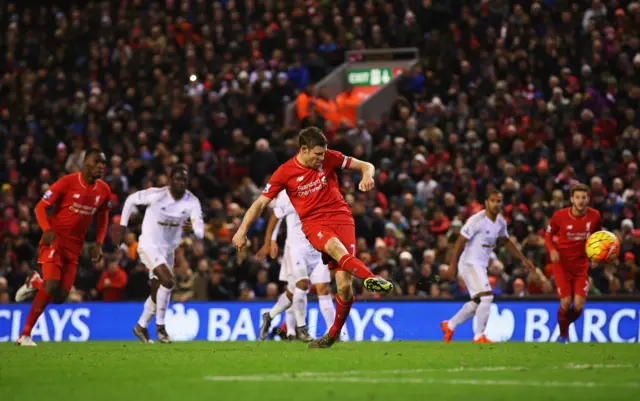 James Milner takes a penalty