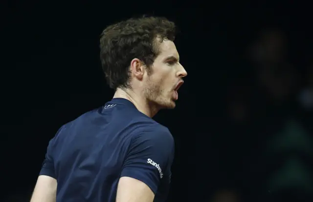 Andy Murray reacts after winning a point