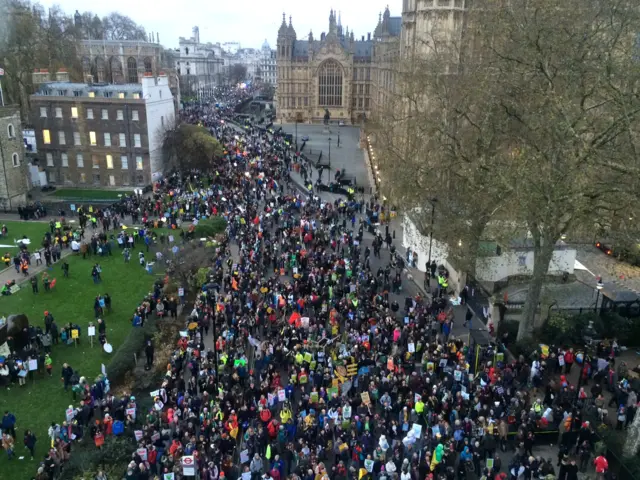 View of protesters from above, in a cherry-picker