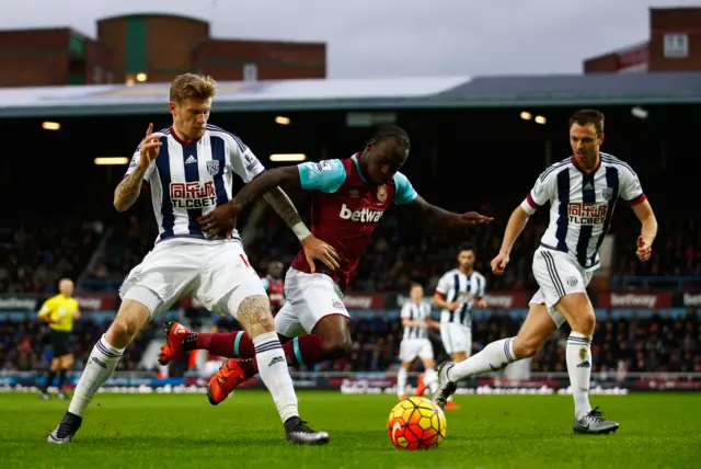 James McLean with Victor Moses and Jonny Evans