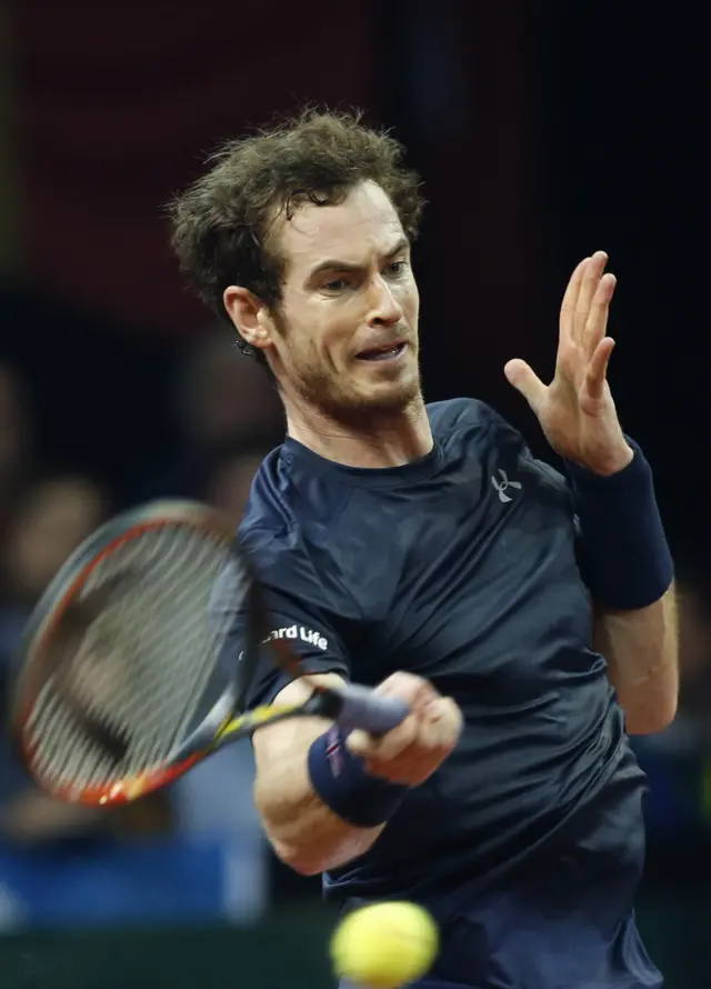 Andy Murray hits a forehand